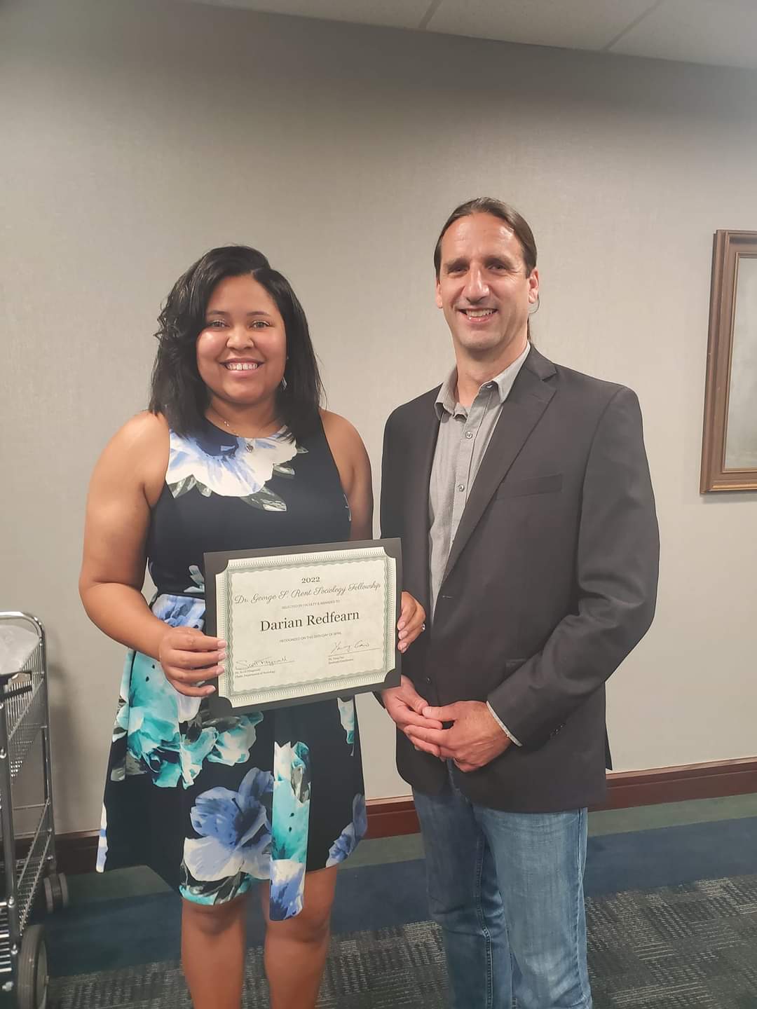 Darian Redfearn, Dr. George Rent Fellowship winner, pictured with Department Chair Dr. Scott Fitzgerald.